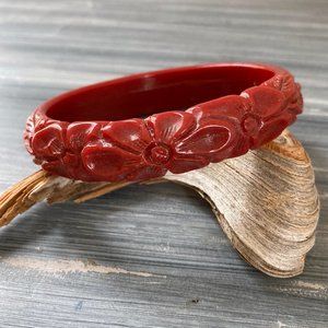 Bakelite celluloid red carved bangle bracelet